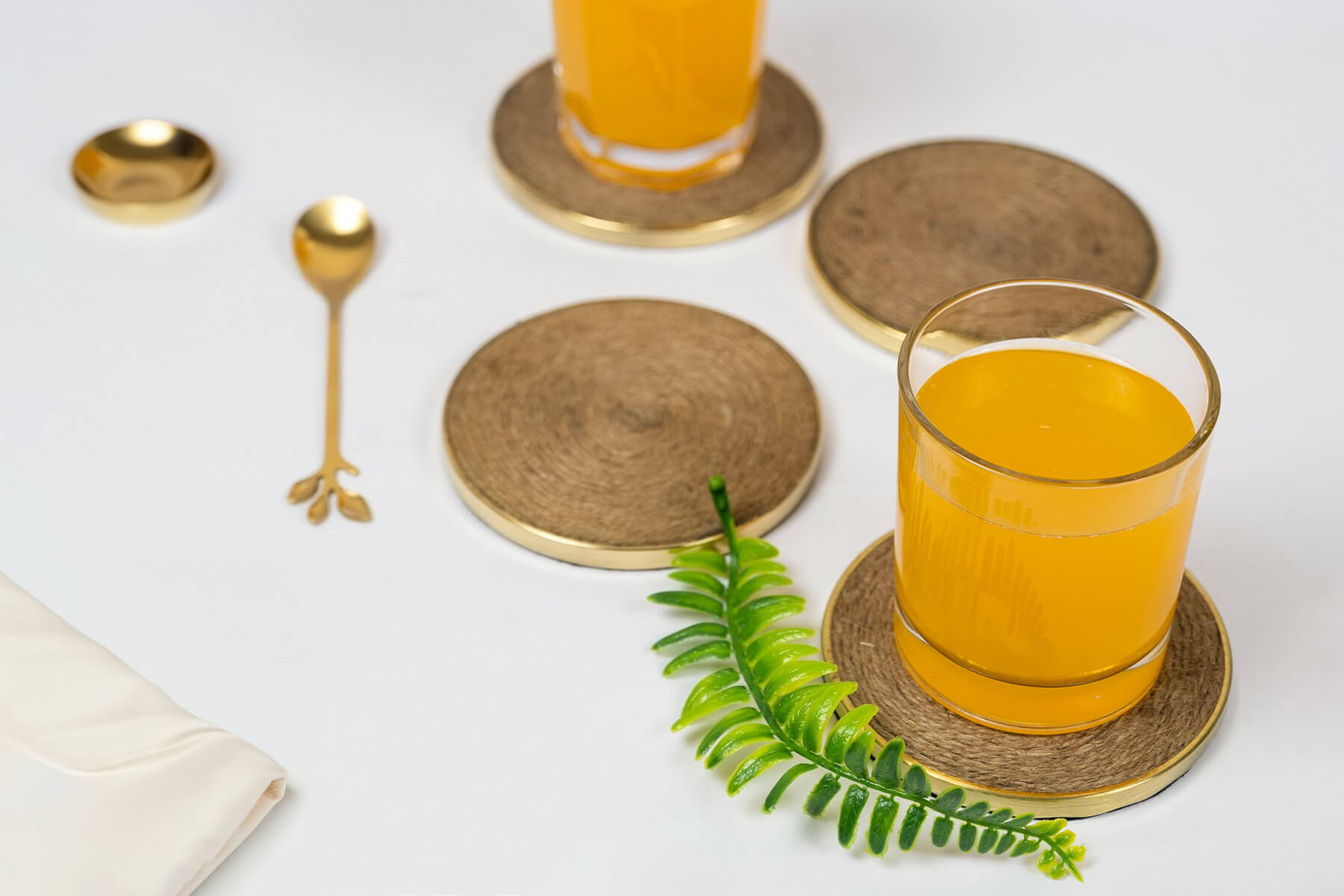 WOODEN COASTERS SET OF 4 WITH GOLDEN BORDER/ SWIRL JUTE DETAILING