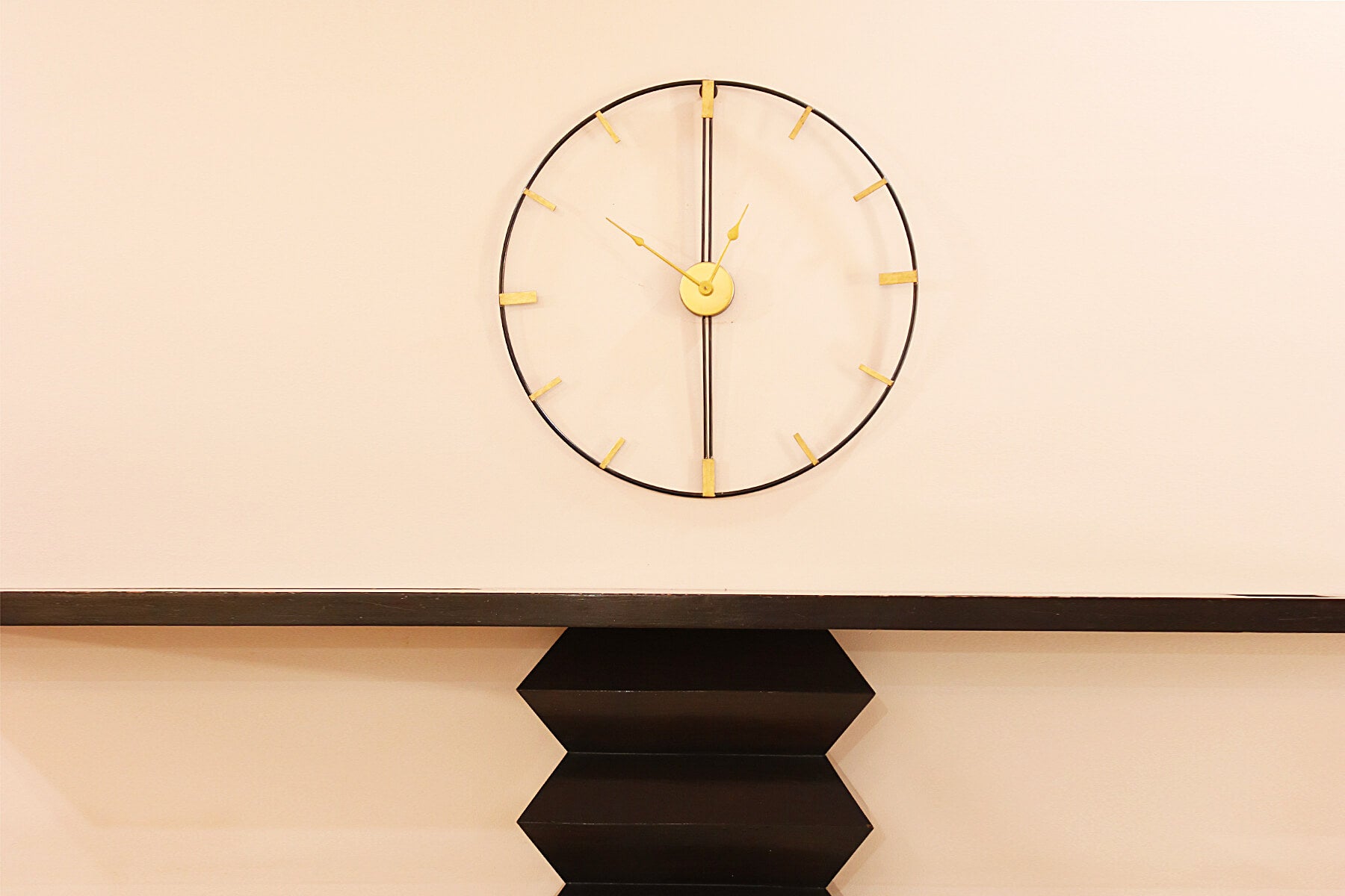 BLACK FRAME WALL CLOCK WITH GOLDEN MARKINGS