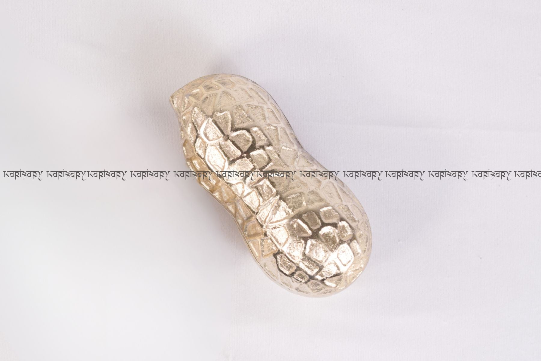 Decorative silver shell on a white background